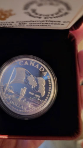 2015 Proof Silver Dollar 50th Anniversary of the Canadian Flag (99.99% pure)