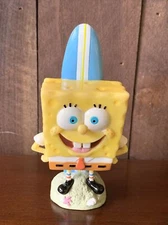 Spongebob with surfboard / 2010 VIACOM INTERNATIONAL / Nickelodeon