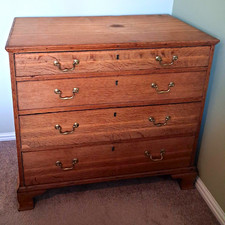 Antique Tiger Wood chest of drawers. 4 drawers with brass handles.