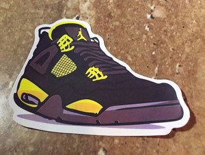 black and yellow jordan retro 4