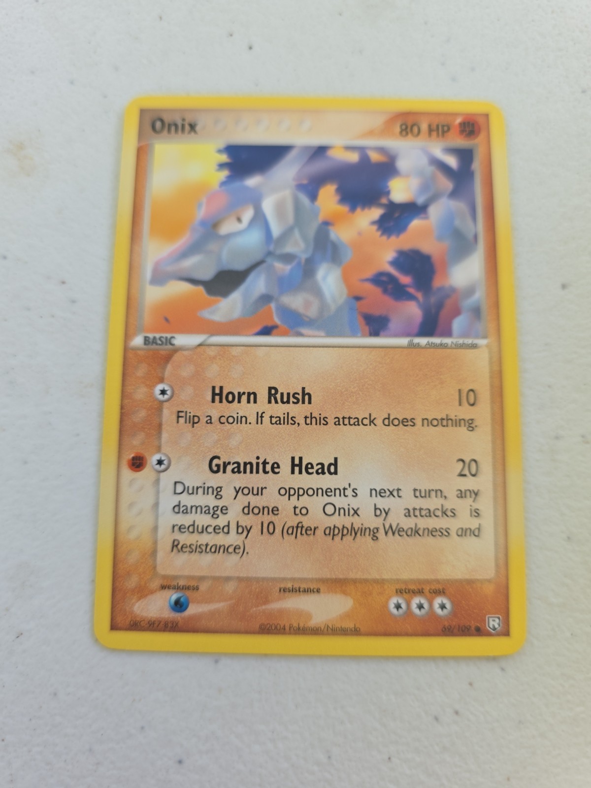 Onix 69/109 - Team Rocket Returns - Near Mint
