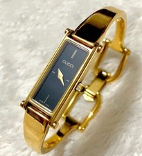 Ladies Gucci Gold Tone Black Dial 1500 Bangle Watch for sale Ladies Gucci Gold Tone Black Dial 1500 Bangle Watch for sale
