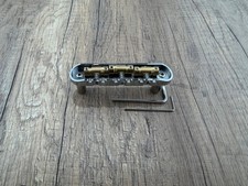 AUMSEN chrome bridge assembly for Jazzmaster and Jaguar 2 1/16 Spacing