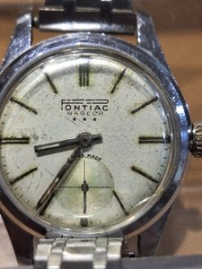 Montre Pontiac Homme 1931 - Mouvement Suisse, étanche 50m, Cadran Bicolore - Très Bon état