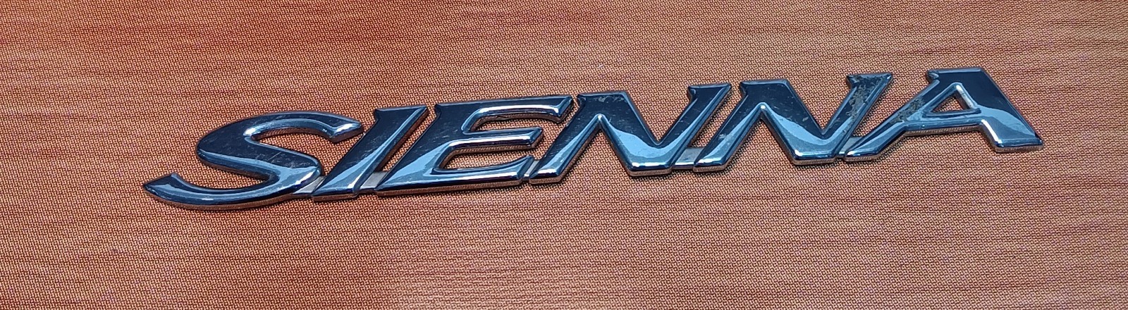 Genuine Toyota Sienna rear emblem USED