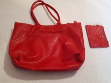 Borsa carpisa in pelle di colore rosso, mai usata con portafoglio 