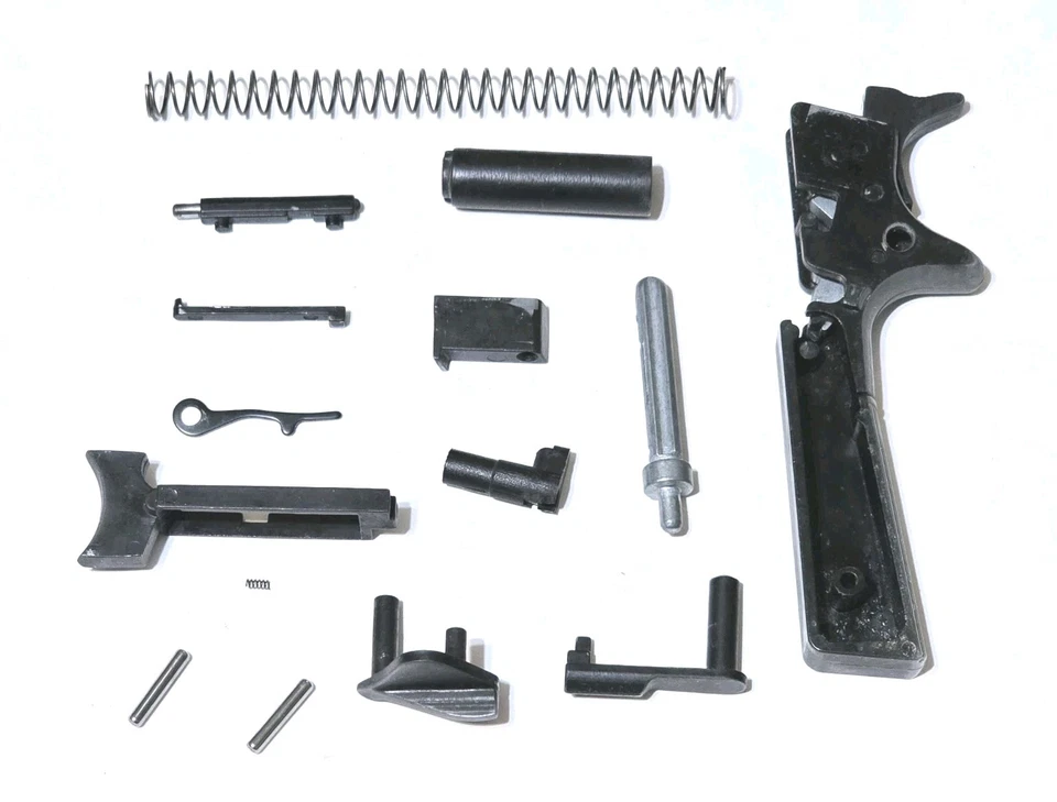 Piezas modelo Chiappa 1911-22; conjunto de martillos, gatillo, seguridad del pulgar, captura magnética, etc. Foto 2 de 4