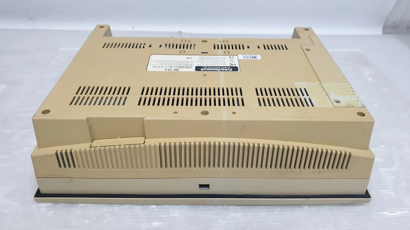 Top of the CyberResearch STC 12-T housing with ventilation slots and nameplate