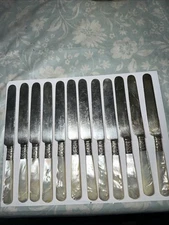 12 ANTIQUE MERIDEN CUTLERY CO 1855 MOTHER OF PEARL & STERLING BAND BUTTER KNIFE