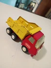 Tonka Mini Tonka Dump Truck Pressed Steel 5" USA Vintage displays nice graphics