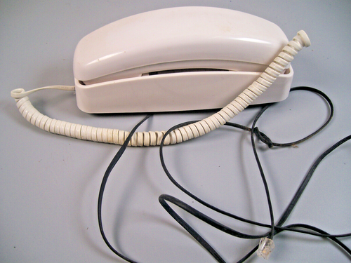 AT&T 210 Basic Trimline Corded Phone No AC Power Required, Wall-Mountable - Picture 6 of 7