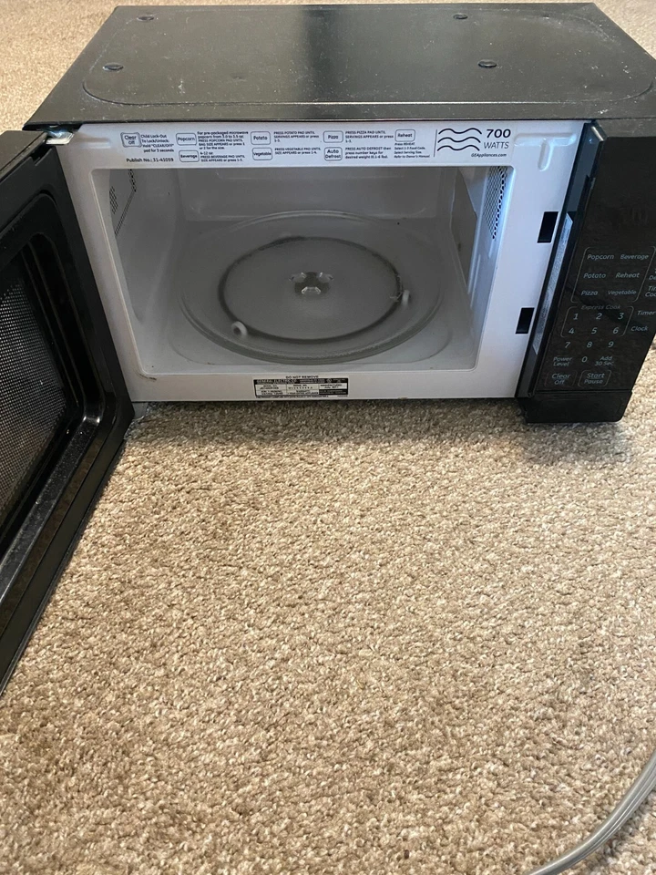 Horno microondas encimera doméstica General Electric negro 700 vatios Foto 2 de 4
