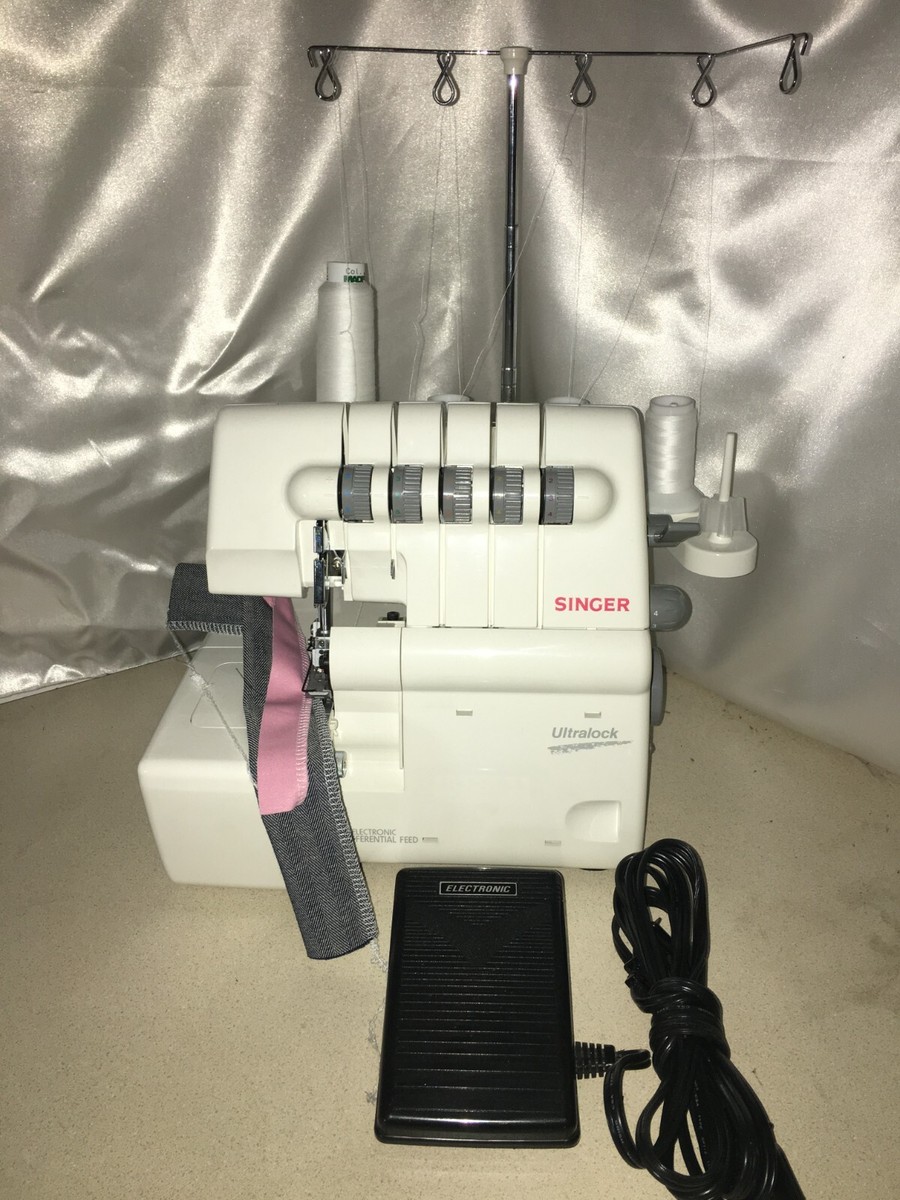 Singer 14U555 serger machine free-arm type w/ freshly done Singer 14U555 serger machine free-arm type w/ freshly done