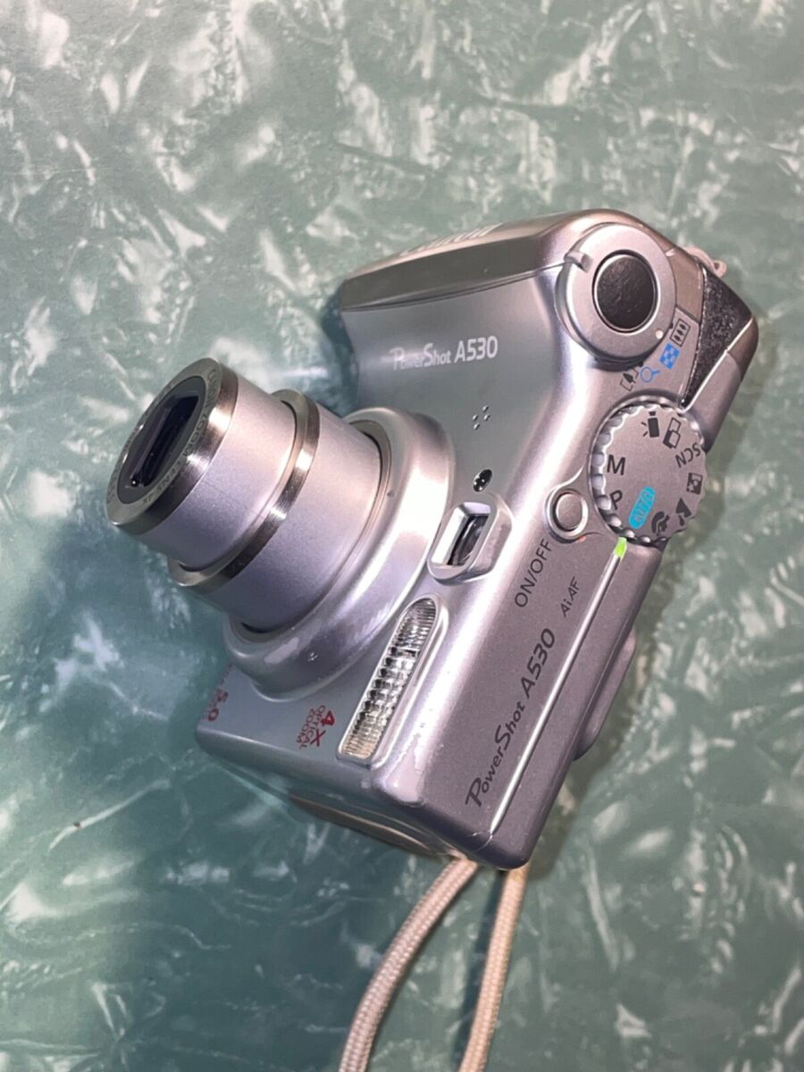 Canon Power Shot A530 Camera -Great- Working-Uses 2 AA Canon Power Shot A530 Camera -Great- Working-Uses 2 AA