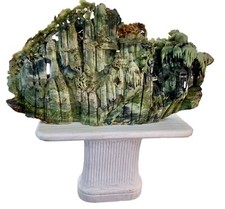 MONUMENTAL ASIAN INSPIRED CARVED SERPENTINE JADE SCULPTURE OF A FOREST LANDSCAPE