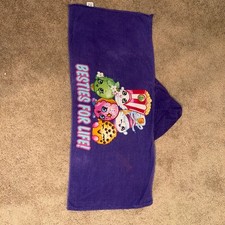 Purple Shopkins hooded towel with graphic of cartoon characters