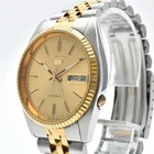 SEIKO 5 7009-3110 Day Date Automatic Vintage Men's Watch Gold Dial Shilver band