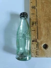 Mini Green glass Coca-Cola Coke bottle With Cap vintage 2.5 inches tall