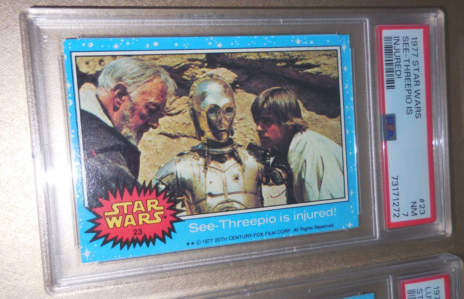 1977 Topps Star Wars #23 See-Threepio is Injured! PSA 7 Near MINT