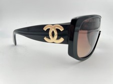 Okulary przeciwsłoneczne Chanel 5495 A Czarno-Złote - usage example