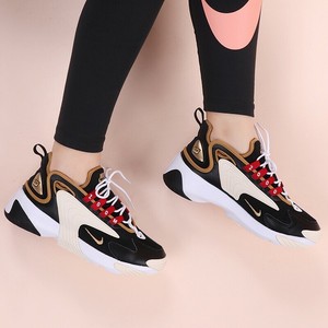 nike zoom 2k trainers in black and gold