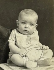 1940s Baby Sitting Portrait Studio Serious Expression Happy Childhood