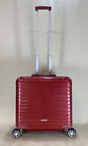 red rimowa luggage