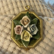 vintage Capodimonte porcelain wall plaque 3D floral designs in a gold-tone frame