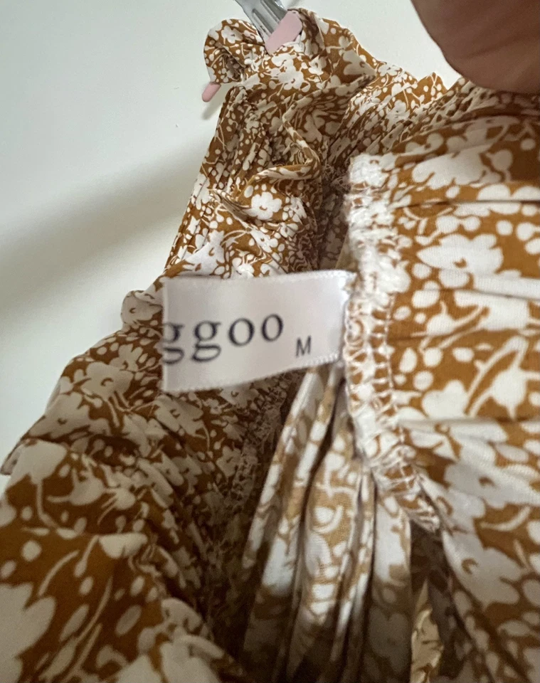 Falda plisada floral amarillo mostaza Foto 2 de 2