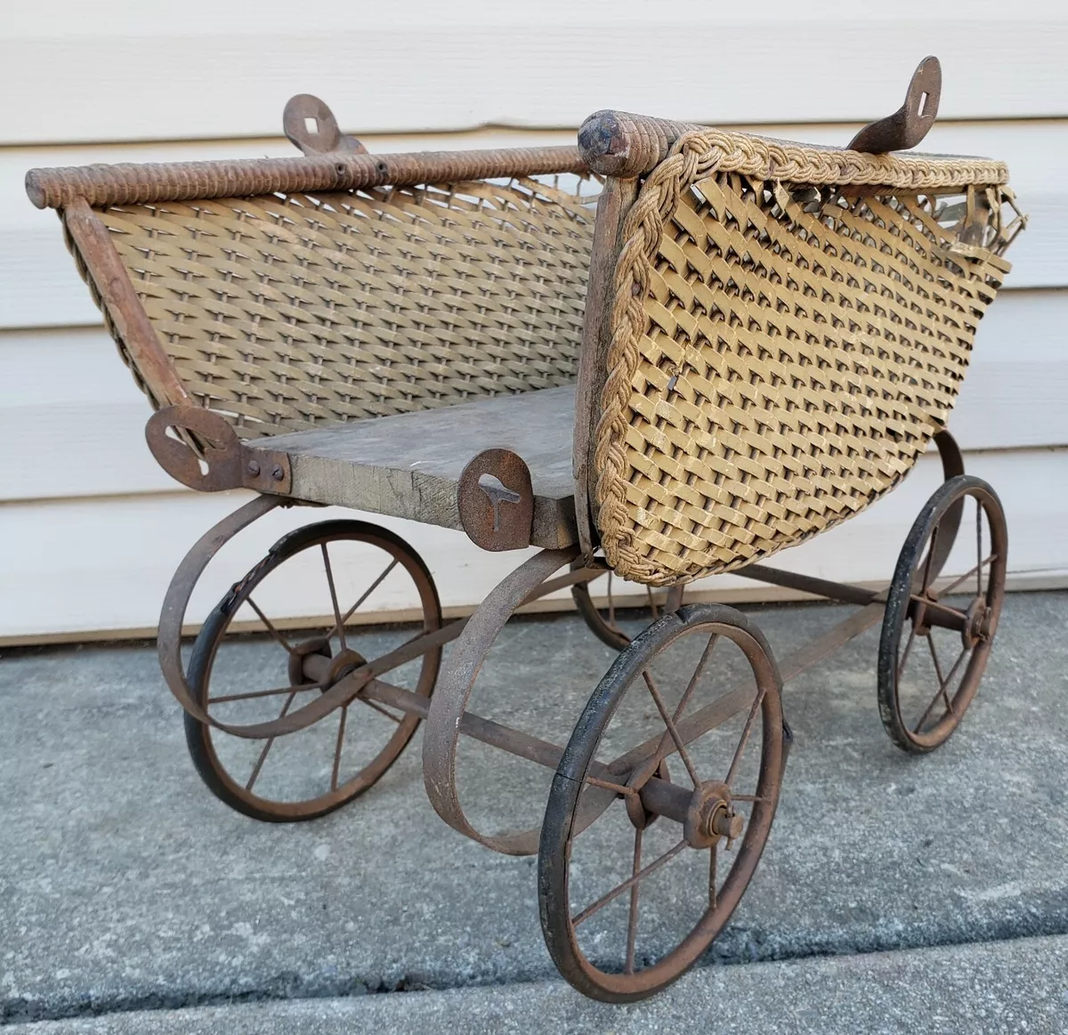 Antique wicker shop doll buggy value