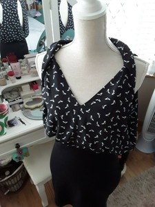 loose top fitted bottom dress