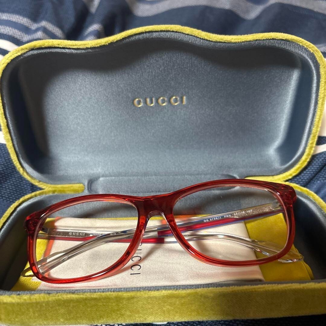 GUCCI Red Frame Glasses Striped temple design Eyewear Fashion