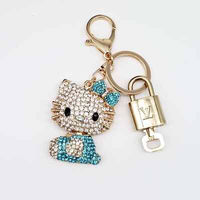LV Gold Padlock   Authentic Louis Vuitton Charm + Unbranded Hello KittyKeychain