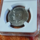 1976 Kennedy Half Dollar 50C Uncertified Coin in Protective Holder United States