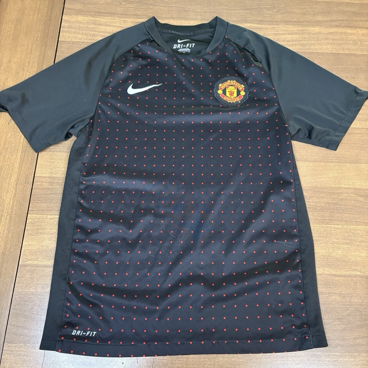 Preços baixos em Equipe Nacional Nike Manchester United Camisas de
