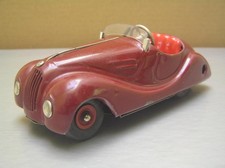 Schuco Akustiko 2002 made in US Zone Germany tin windup maroon and red EXC