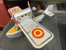 Vintage Tin Litho Toy Airplane with wheels and moving propellers