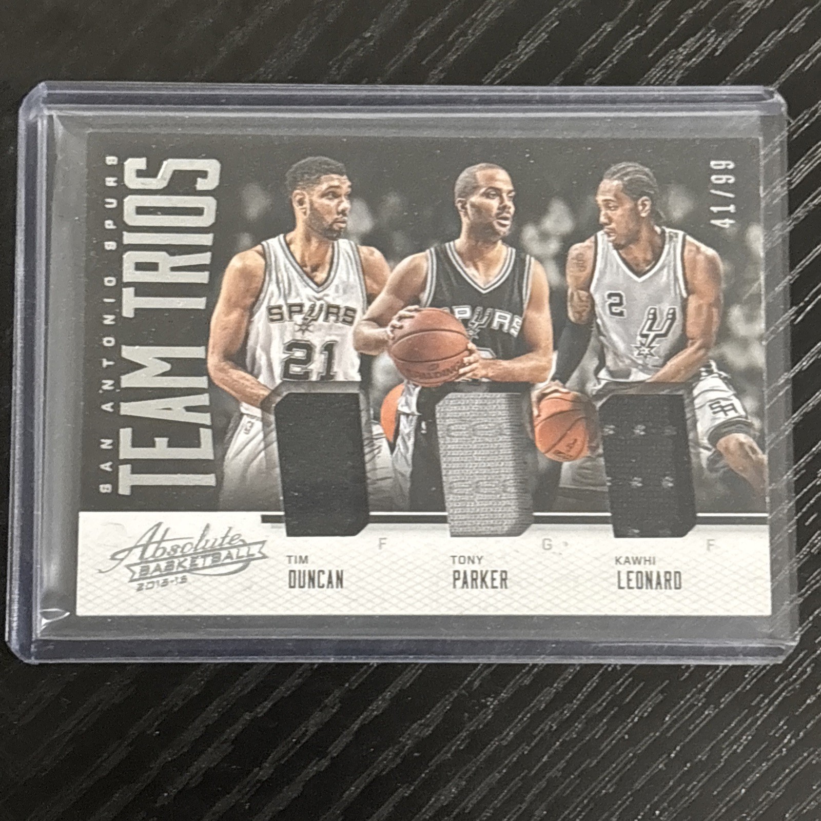 15-16 ABSOLUTE TEAM TRIOS TRIPLE PATCH TIM DUNCAN KAWHI LEONARD TONY PARKER /99