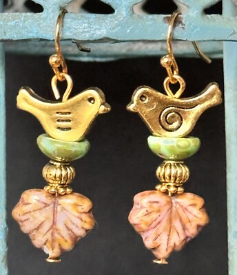 Sweet Gold Bird with Green and Dusty Rose Picasso Leaf Earrings.