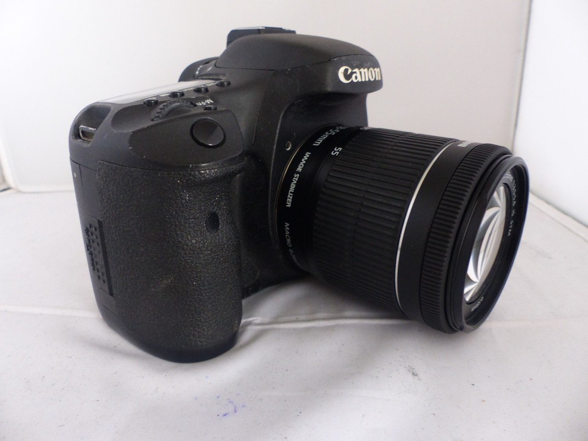 Canon EOS 7D 18 MP. Comes with a Canon 18-55mm Zoom lens. Look