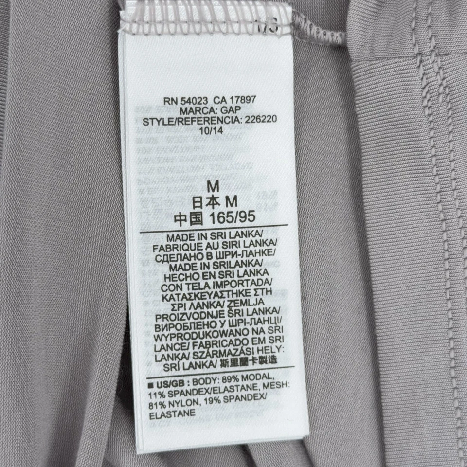 Camiseta sin mangas GAP para mujer gris espalda deportiva detalle de malla atletismo entrenamiento talla mediana Foto 3 de 4
