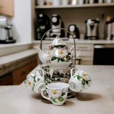 White Ceramic Tea Set Elegant White Flower Design Teapot and Cups on Metal Stand