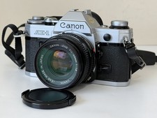 Canon AE-1 35mm SLR Film Camera w/ Canon 50mm f/1.8 FD Lens Japan Excellent
