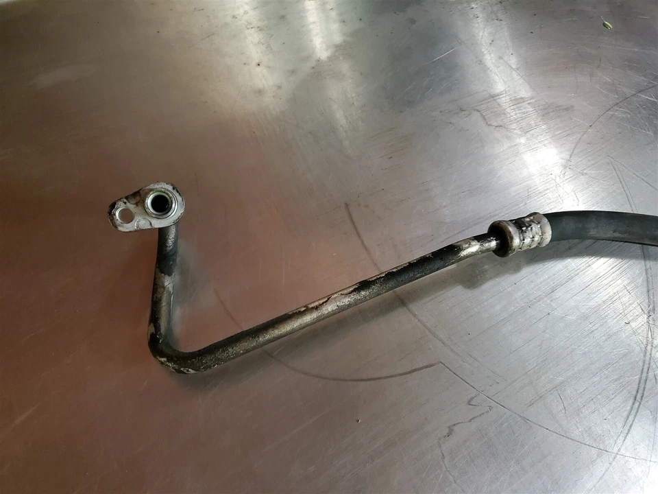 Tubo de manguera de aire acondicionado Cadillac SRX 2004-2009 maletero trasero usado OEM Foto 2 de 4