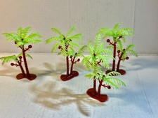 Lot of four plastic 2.5" tall Palm trees for your display. Diorama or playset.