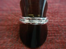 STERLING SILVER BAND RING - ATTRACTIVE RING AND SPARKLY STONES