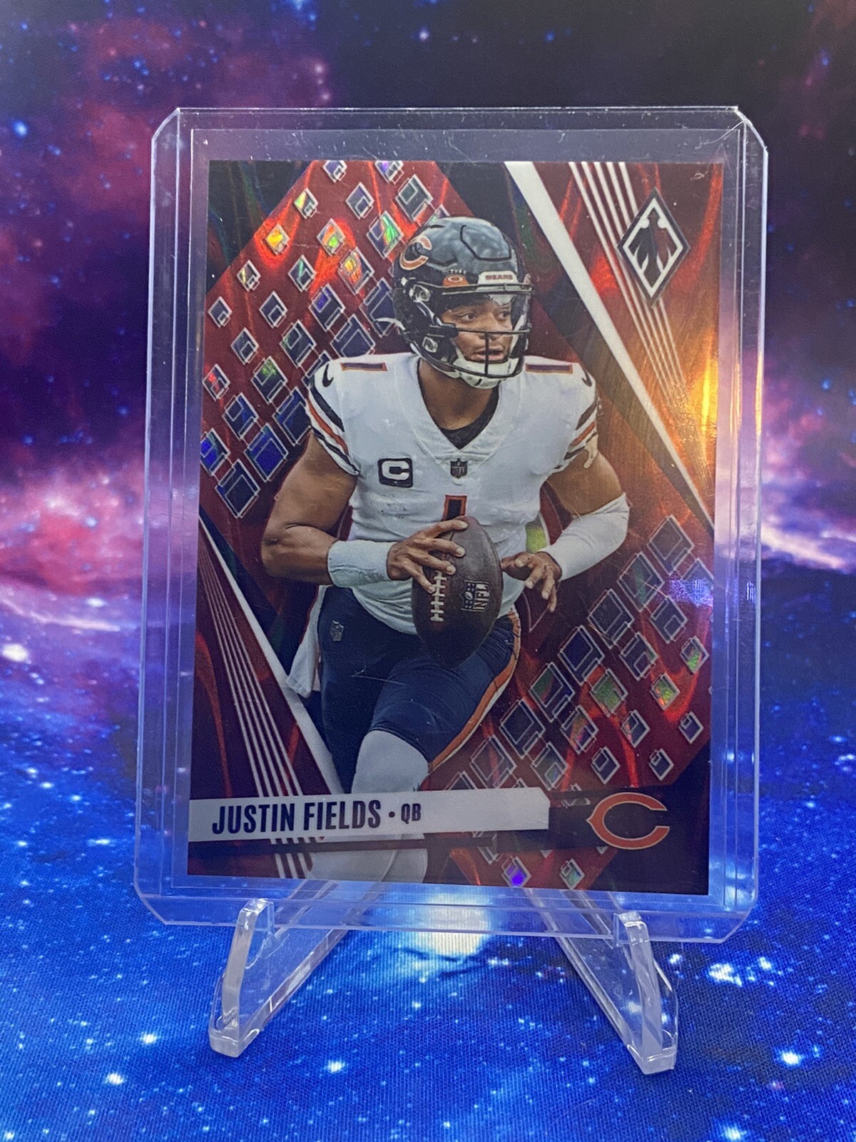 2023 Panini Phoenix - Red Seismic SP Variation #26 Justin Fields /199