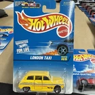 VINTAGE HOT WHEELS 1996 YELLOW LONDON TAXI #619 LONDON CAB CO. NIP