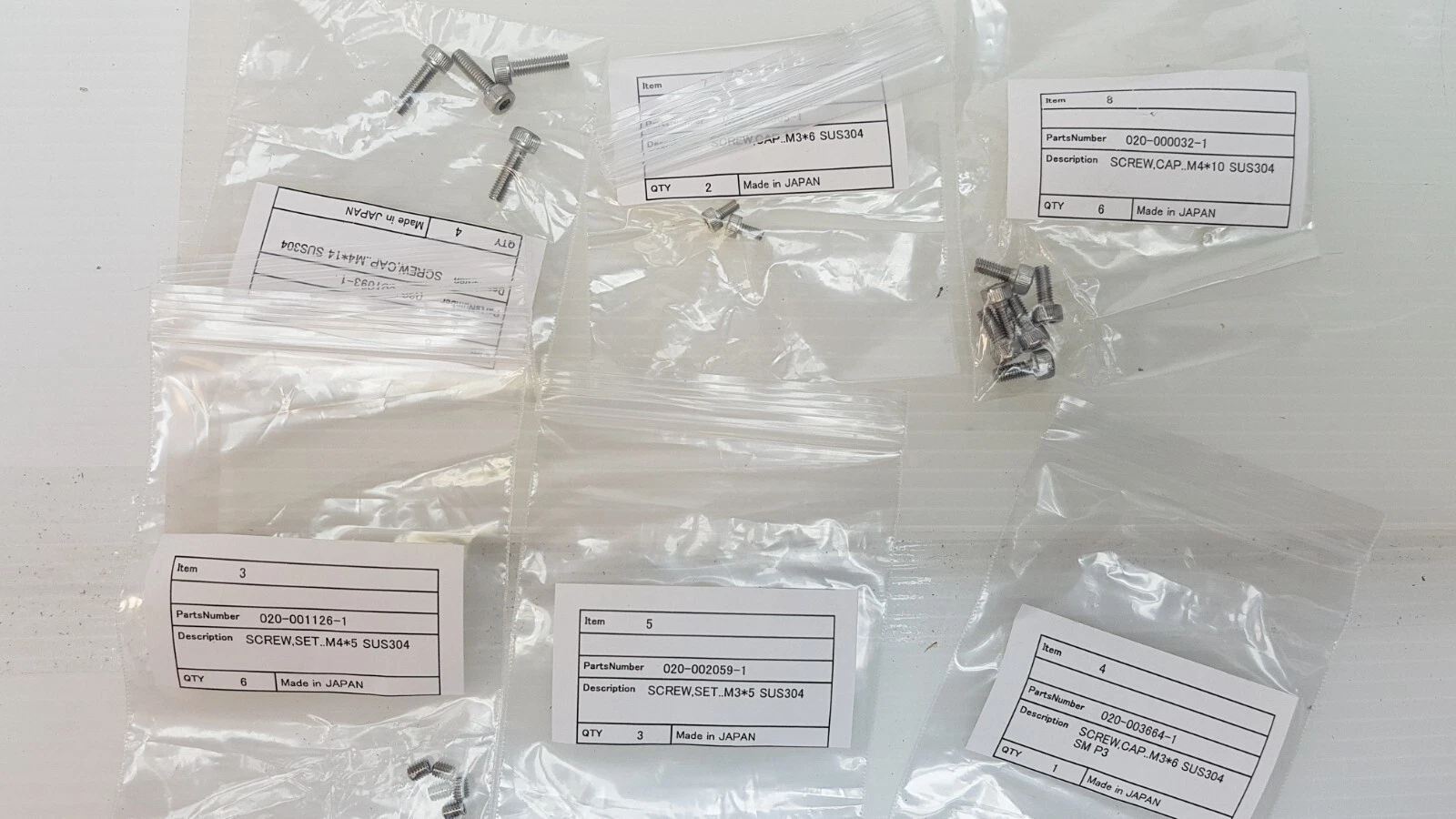 Labeled bags of SUS304 M3 and M4 cap and set screws, made in Japan