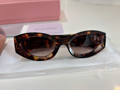 Miu Miu Cat Eye Tortoise Shell Sunglasses Brown Tinted Lens  display picture 1